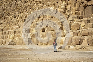 Woman at the base of the Cheops