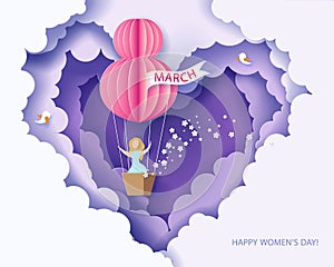 Woman in basket of hot air balloon photo