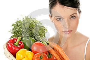 Woman with basket with vegetables