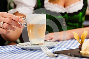 Woman in Bavarian Tracht in restaurant or pub