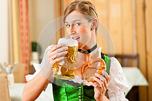 Woman in Bavarian Tracht in restaurant or pub