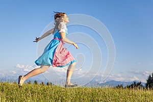 Woman in bavarian traditional dirndl