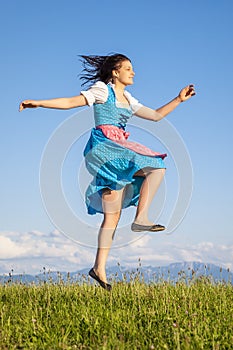 Woman in bavarian traditional dirndl