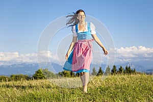 Woman in bavarian traditional dirndl