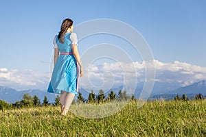 Woman in bavarian traditional dirndl