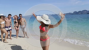 Woman On Beach Holding Cell Smart Phone Call People Group To Take Selfie Photo, Happy Smiling Young Tourists Group