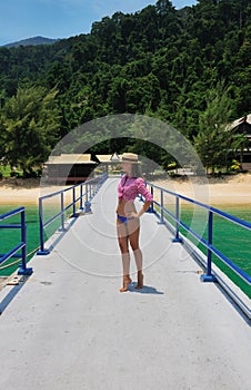 Woman at beach jetty