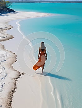 woman beach sand paradise ocean sea back drone top view waves silence serenity zen tranquility