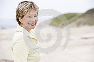 Woman at the beach smiling