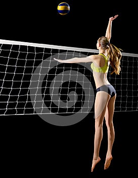 Woman beach volleyball player with ball and net version