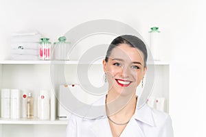 Woman beautician doctor at work in spa center. Portrait of a young female professional cosmetologist. Female employee in