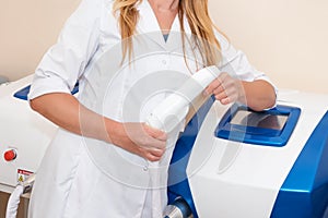 Woman beautician doctor at work in spa center. Young female professional cosmetologist. Female employee in cosmetology