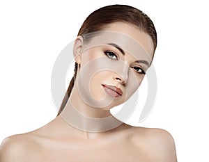 Woman with beautiful face, healthy skin and her hair on a back close up portrait studio on white