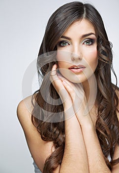 Woman beautiful face portrait. Skin care style face hand touchi