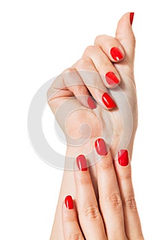 Woman with beautiful manicured red fingernails