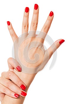 Woman with beautiful manicured red fingernails