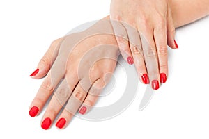 Woman with beautiful manicured red fingernails