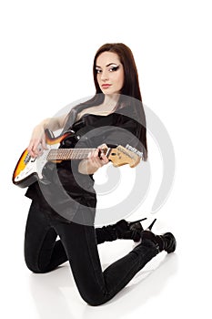 Woman beautiful musician playing guitar electric