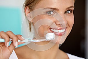 Woman With Beautiful Smile, Healthy White Teeth With Toothbrush