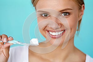 Woman With Beautiful Smile, Healthy White Teeth With Toothbrush