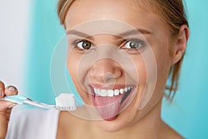 Woman With Beautiful Smile, Healthy White Teeth With Toothbrush