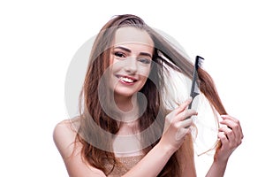 The woman in beauty concept combing hair