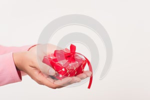 Woman beauty hands holding small gift package box present