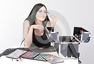 Woman with beauty kit