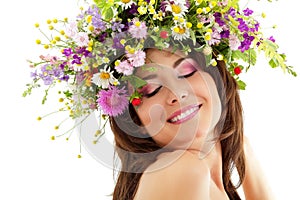 Woman beauty with summer wild flowers