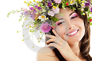 Woman beauty with summer wild flowers