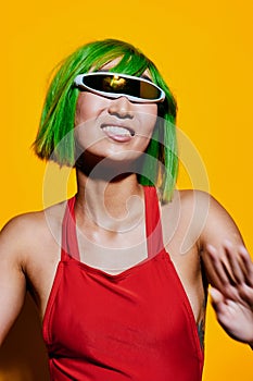 Yellow woman red beauty sunglasses trendy portrait smile swimsuit wig retro excited fashion summer