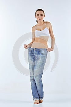 Woman became skinny and wearing old jeans