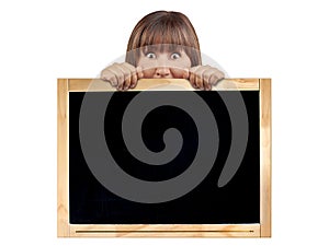 Woman behind blackboard chalkboard surprised scared isolated