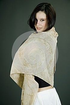 Woman with beige scarf