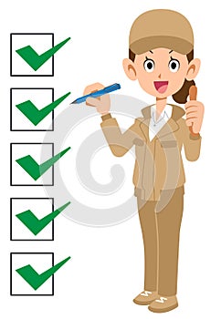 Woman in beige workwear with completed checklist