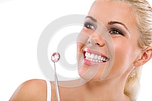 Woman being at the dentist photo