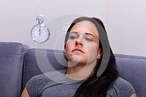 Woman Being Hypnotized With Pendulum