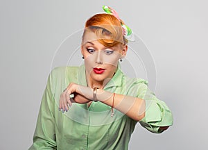 Woman being late to a date.looking at watch.