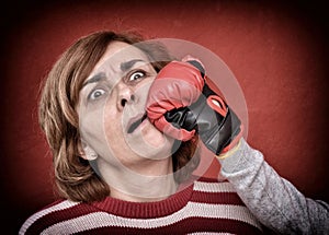 Woman being punched in her face