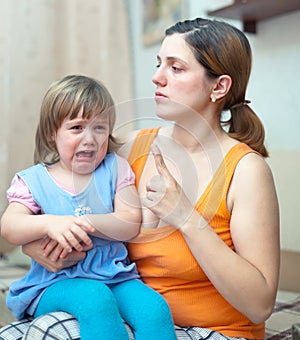 Woman berates crying baby