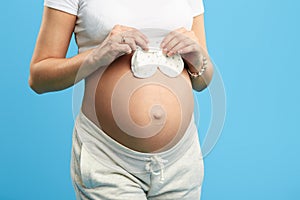 Woman with big belly is in the third trimestere. prenatal care
