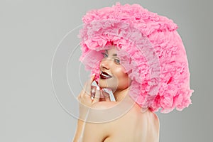 Woman Big Hat and Lips. Model wearing Fabric with lace ruffles hat. High Fashion Model fabric crown or hairstyle