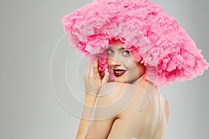 Woman Big Hat and Lips. Model wearing Fabric with lace ruffles hat. High Fashion Model fabric crown or hairstyle