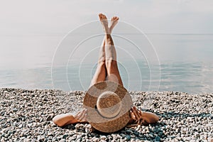 Woman bikini beach tan. Happy woman in swimwear and hat on vacation. Summer travel holidays vacation on the sea