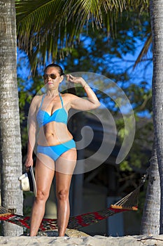 Woman with bikini blue show shape beautiful morning