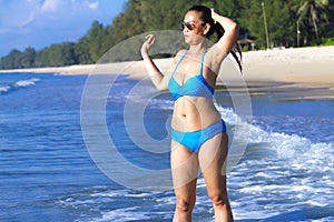 Woman and bikini blue show shape large relax at beach