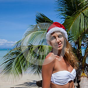 Woman in bikini celebrating Christmas