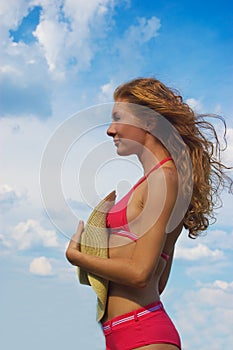 Woman in bikini with flying hair