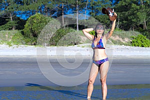Woman and bikini relax on beach Ban Krut