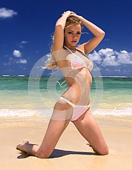 Woman in a bikini at a tropical beach